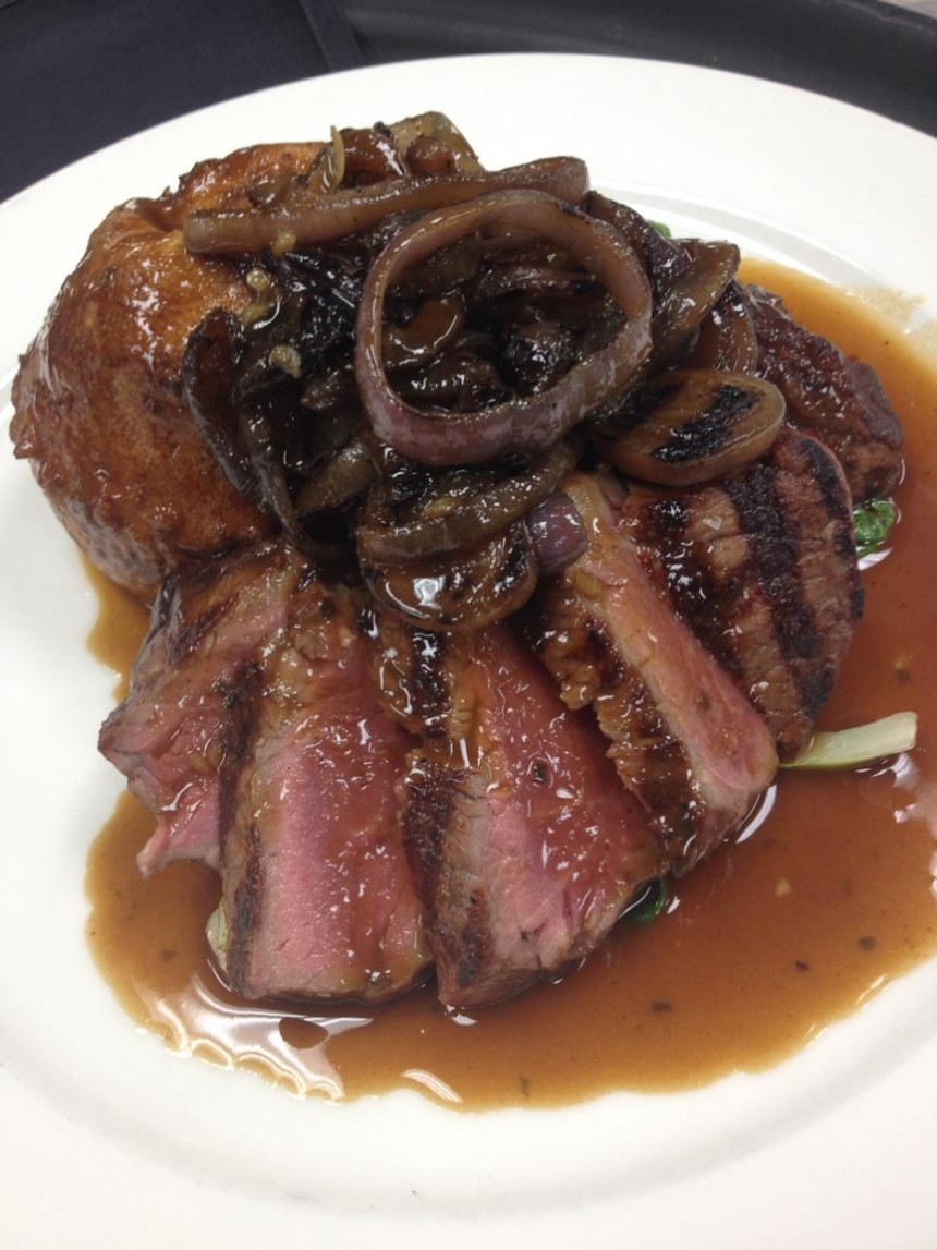 Beef Combination: Wood-Grilled CDK Ranch Strip and Braised Beef Cheeks, Yorkshire Pudding,  Tatsoi, Grilled Red Onions, Horseradish Beef Jus