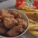 Sweet Yuca Fritters and Fresh Mango with Spiced Rum Butter ►