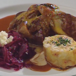 Saddle of Venison in Juniper Cream Sauce au Gratin with Mushrooms, Served with Red Cabbage and Sliced Bread Dumplings ▶