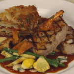 Grilled Veal Loin Medallions with Chanterelle and Lobster Mushroom Potato Galette and Calvados Veal Reduction