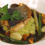 Sea Bass on Crushed Scallion Potatoes with Caramelized Spring Vegetables