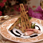 Salad with Lobster-stuffed Rigatoni and Coralline Sauce with Olive Pastry Crisps