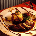 Chili-rubbed Pork Tenderloin with Savory Wild Mushroom Bread Pudding