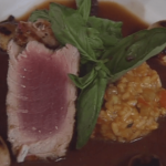 Grilled Yellowfin Tuna with Ratatouille, Risotto, Grilled Shallots, and Red Wine–Morel Sauce