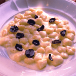 Gnocchi Stuffed with Fonduta in Parmesan Cheese–Cream Sauce